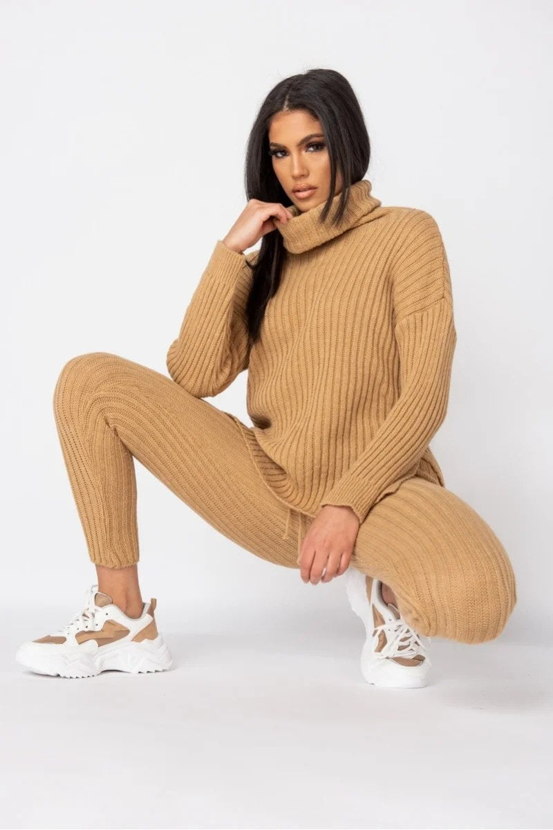 A stylish beige rib knit roll neck jumper and legging lounge set displayed on a mannequin, showcasing its soft texture and comfortable fit.