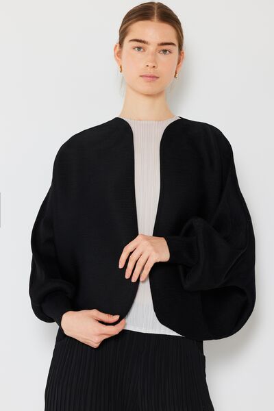 Rib pleated puff sleeve bolero cardigan in a stylish design, featuring ribbed texture and feminine puff sleeves, perfect for layering.