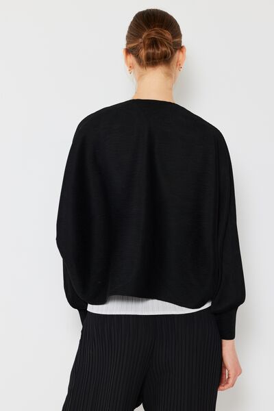 Rib pleated puff sleeve bolero cardigan in a stylish design, featuring ribbed texture and feminine puff sleeves, perfect for layering.