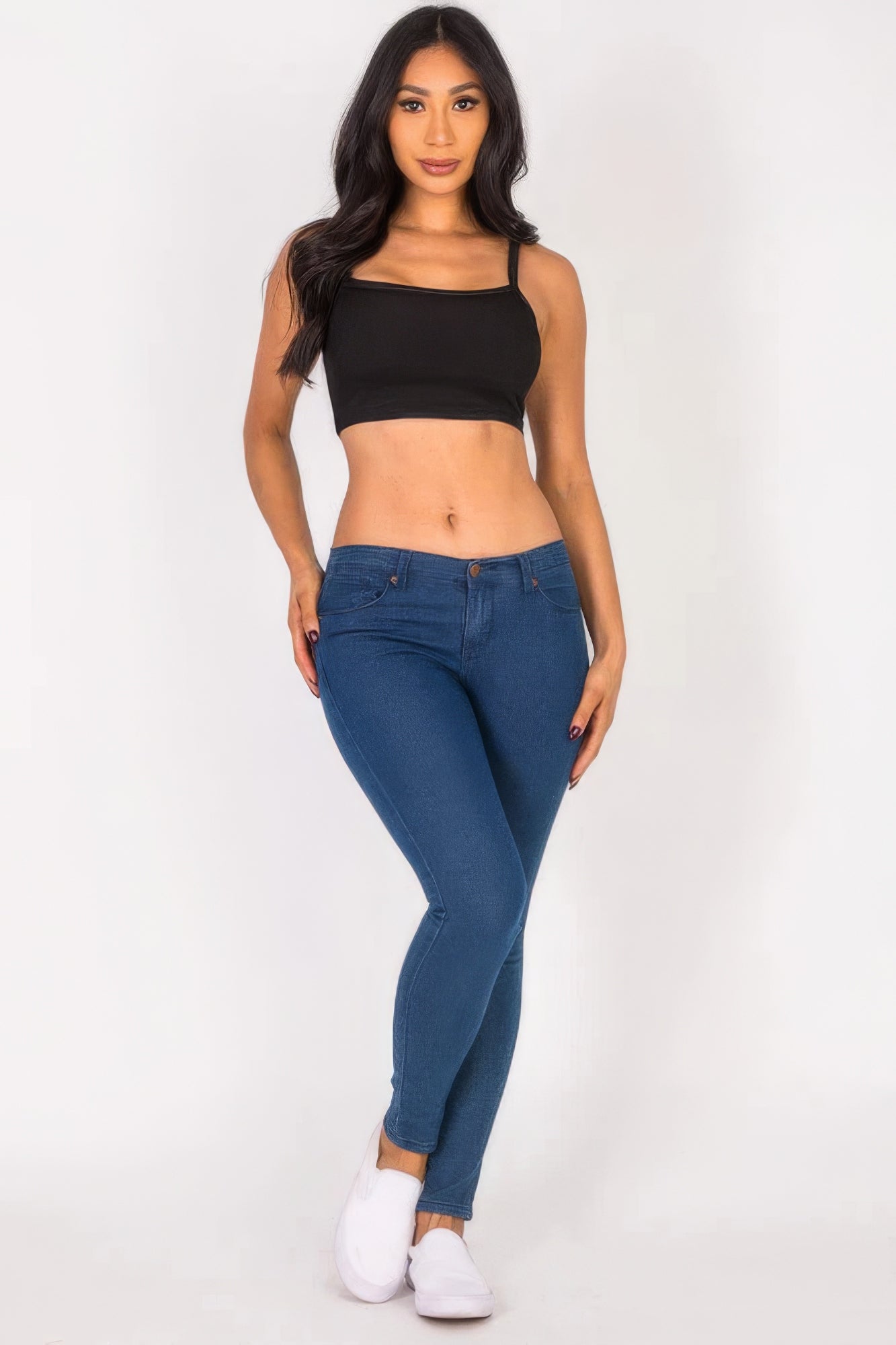 Ribbed Knit Cami Crop Top in classic black, showcasing its fitted silhouette and trendy ribbed texture.
