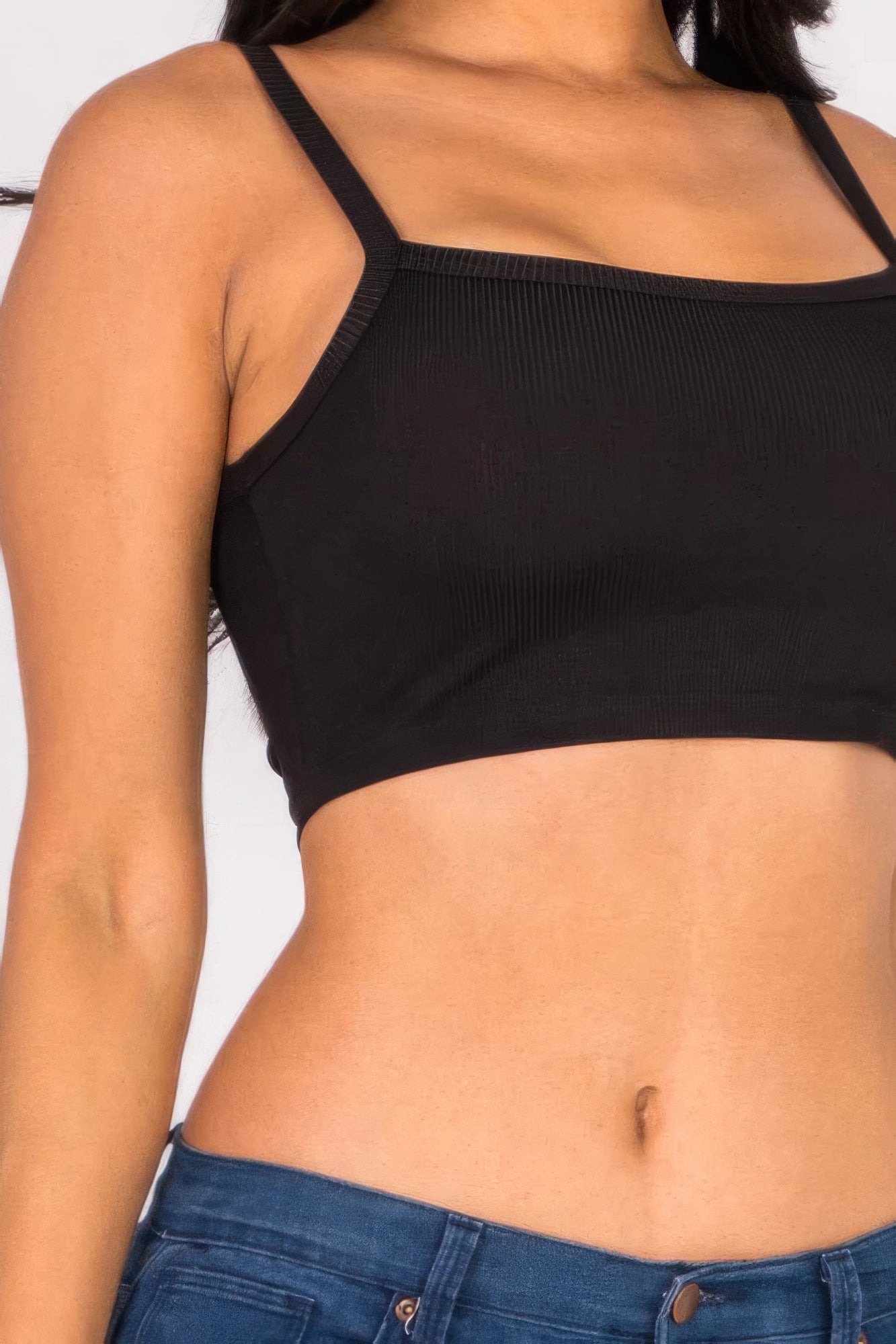 Ribbed Knit Cami Crop Top in classic black, showcasing its fitted silhouette and trendy ribbed texture.