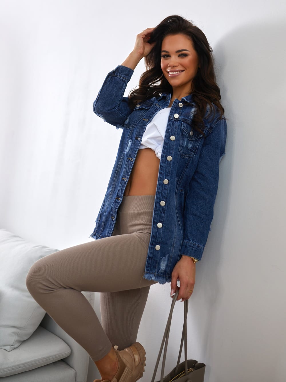 Ribbed women's leggings in cappuccino color, showcasing the elastic waistband and textured fabric.