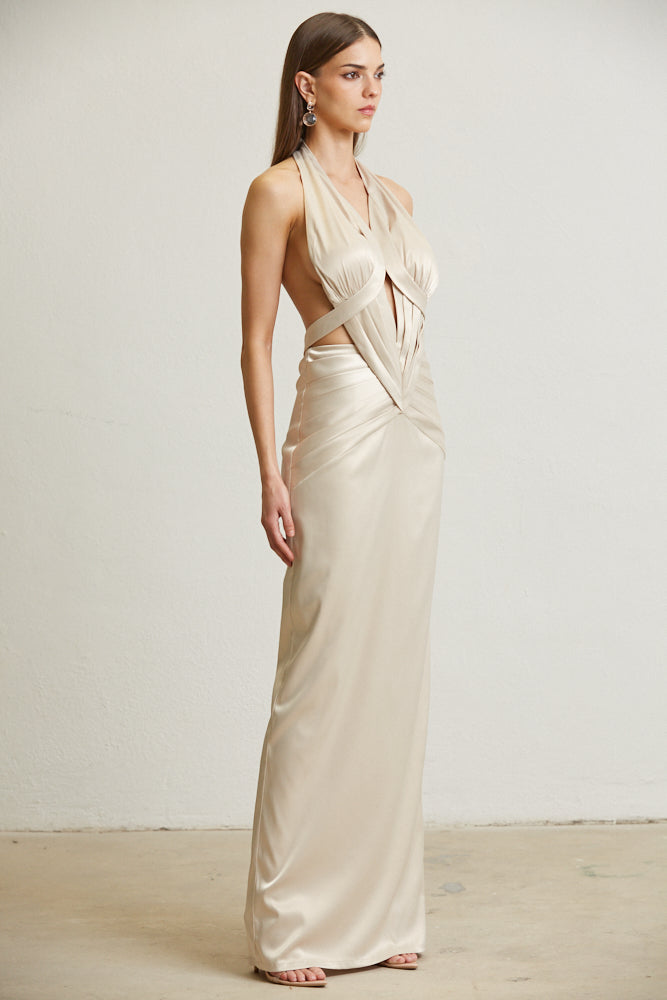 Riley Dress featuring luxe satin fabric, halter neck, backless design, and pleated detailing, perfect for elegant occasions.