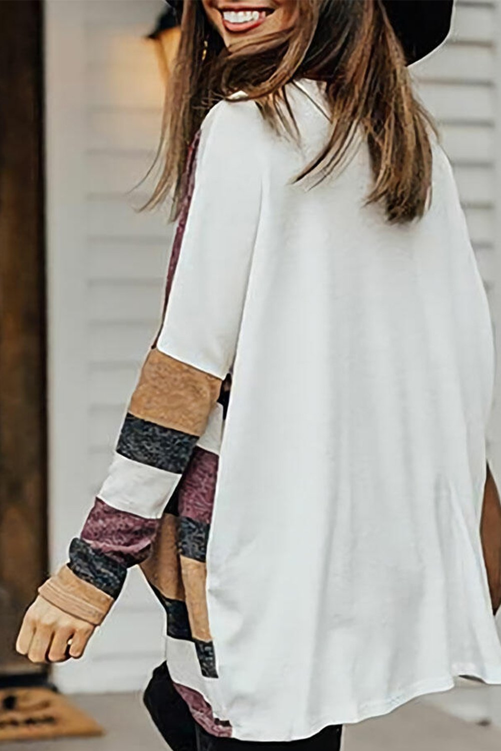 A vibrant Round Neck Colorful Stripe Tunic Top featuring a stylish striped pattern, round neckline, and long sleeves, perfect for casual wear.