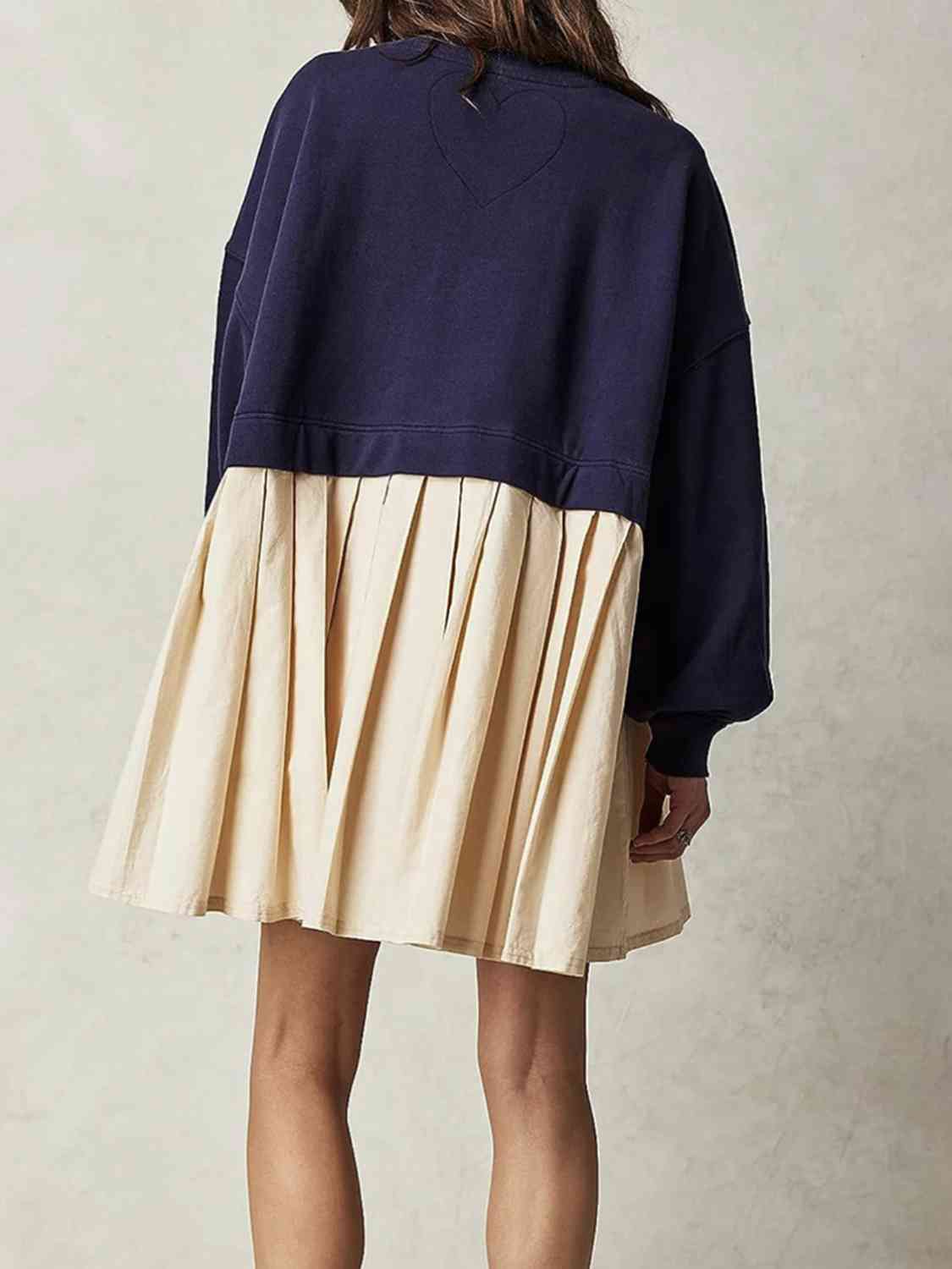 Round Neck Drop Shoulder Dress featuring pleated design and drop shoulder style, made from 100% polyester in a stylish and comfortable fit.