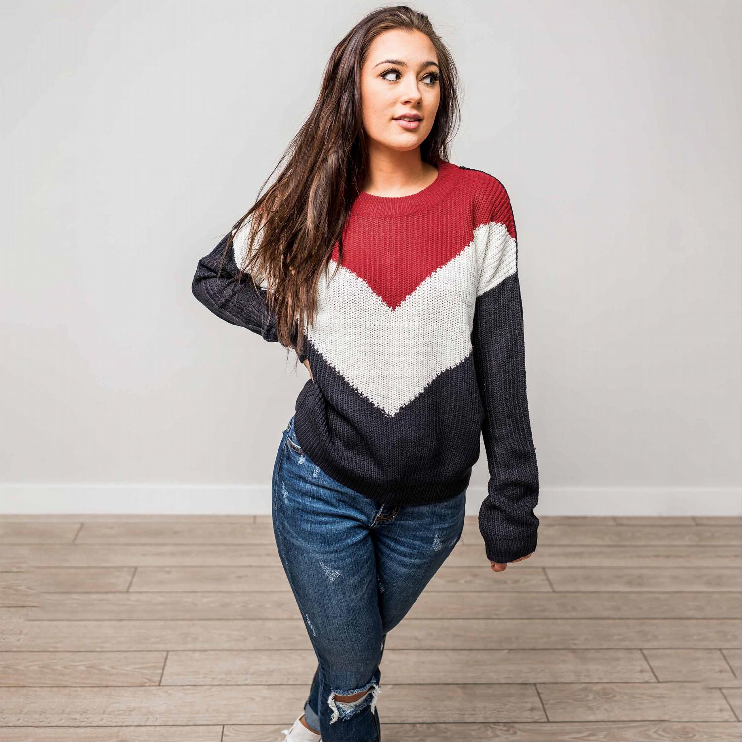 A stylish Round Neck Long Sleeve Chevron Colorblock Sweater featuring a trendy chevron pattern in vibrant colors, perfect for winter wear.