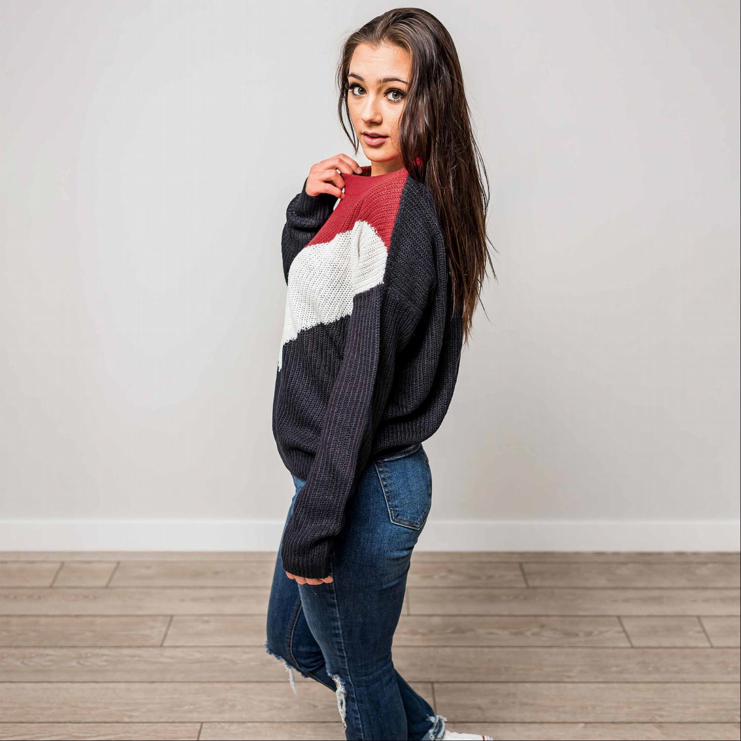 A stylish Round Neck Long Sleeve Chevron Colorblock Sweater featuring a trendy chevron pattern in vibrant colors, perfect for winter wear.