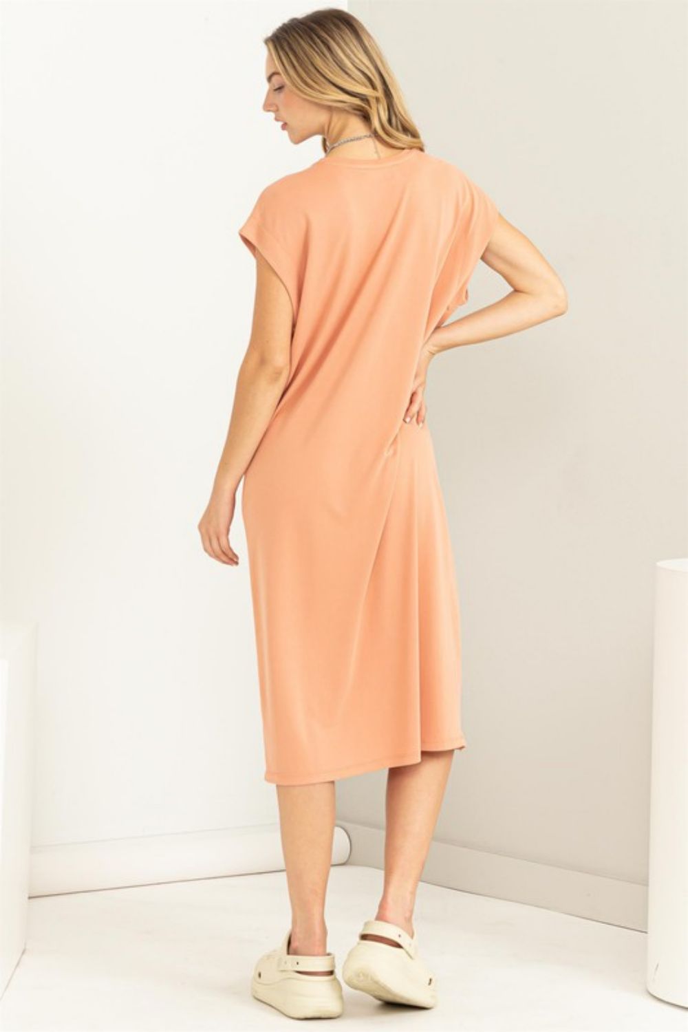 Round Neck Midi Tee Dress in Dusty Clay, featuring a classic round neck, short sleeves, and a flattering midi length.