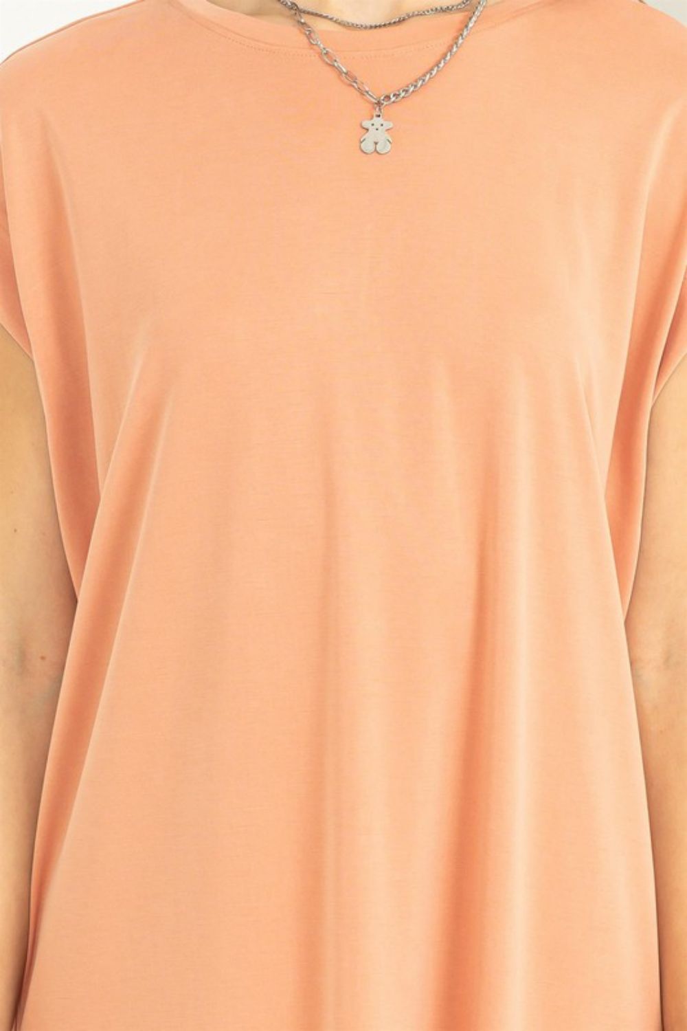 Round Neck Midi Tee Dress in Dusty Clay, featuring a classic round neck, short sleeves, and a flattering midi length.