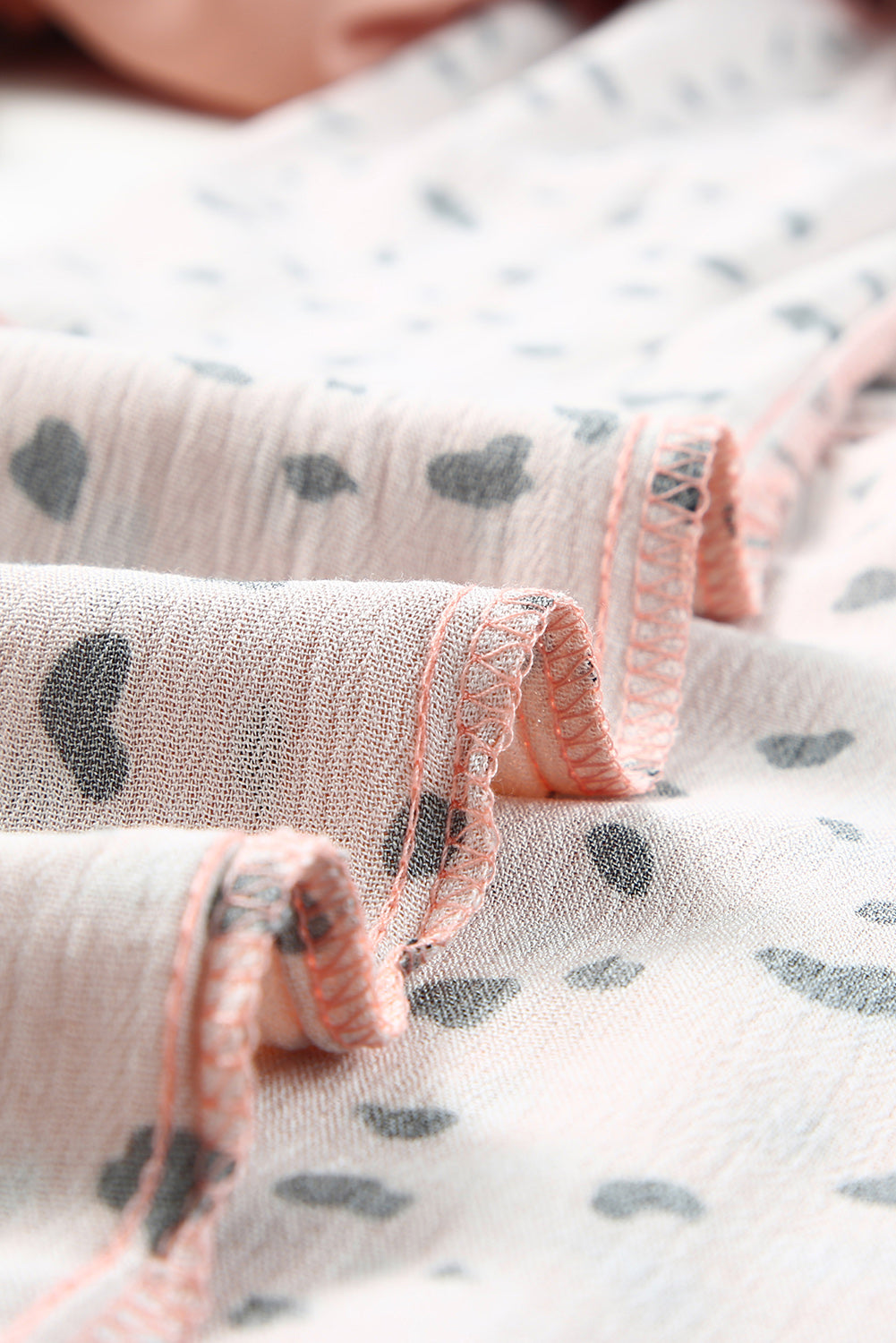 Ruffle Wide Leg Dalmatian Palazzo Pants featuring a stylish Dalmatian print, ruffled design, and wide leg fit, perfect for casual wear.