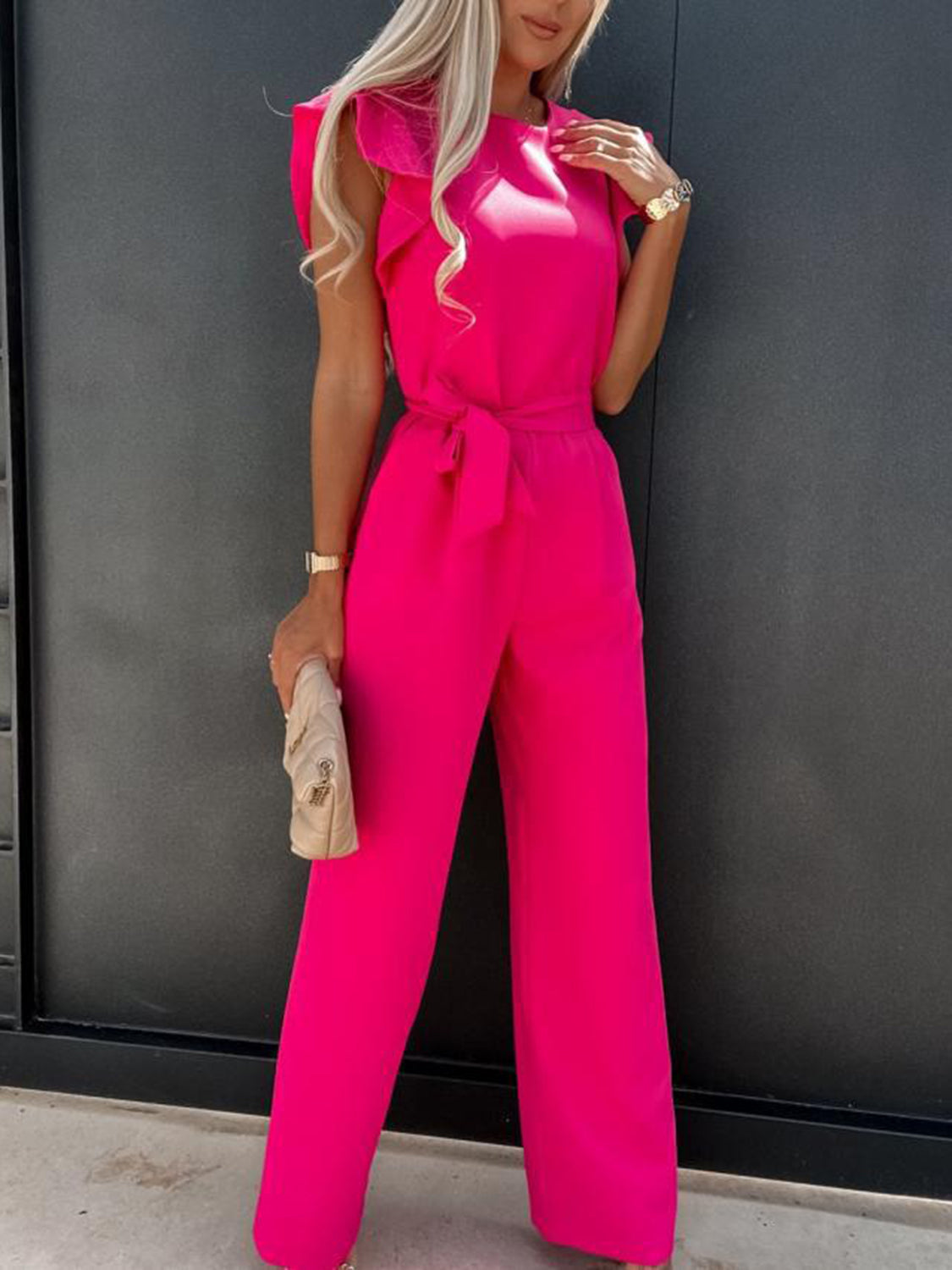 A stylish Ruffled Round Neck Cap Sleeve Jumpsuit in a flattering fit, showcasing its elegant design and comfortable fabric.