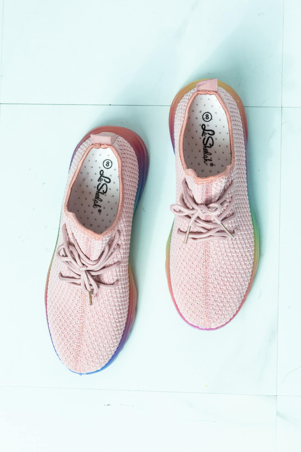 Runner's Delight Color Block Lace-Up Sneaker in Mauve featuring a vibrant rainbow gradient sole and breathable fabric upper.