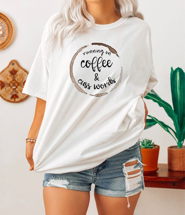 A stylish unisex crew neck tee featuring the phrase 'Running on Coffee and Cuss Words' printed on it, made from soft cotton fabric.