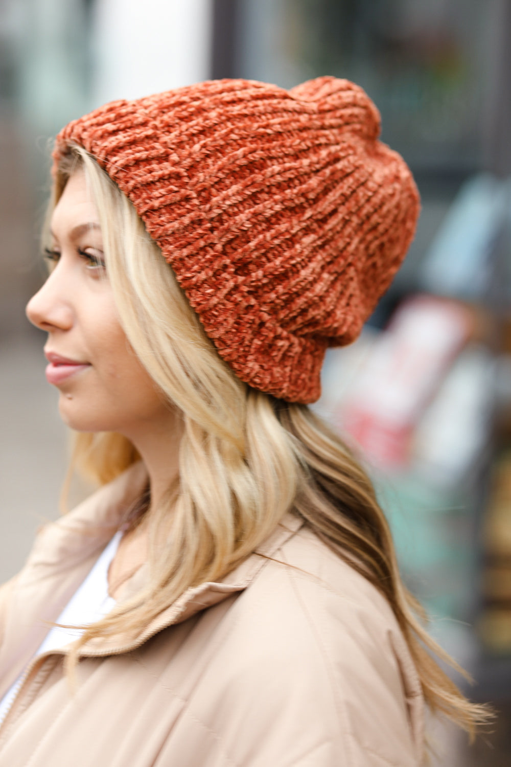 Rust Knit Velvet Chenille Fold Over Beanie showcasing its soft texture and stylish design, perfect for winter wear.