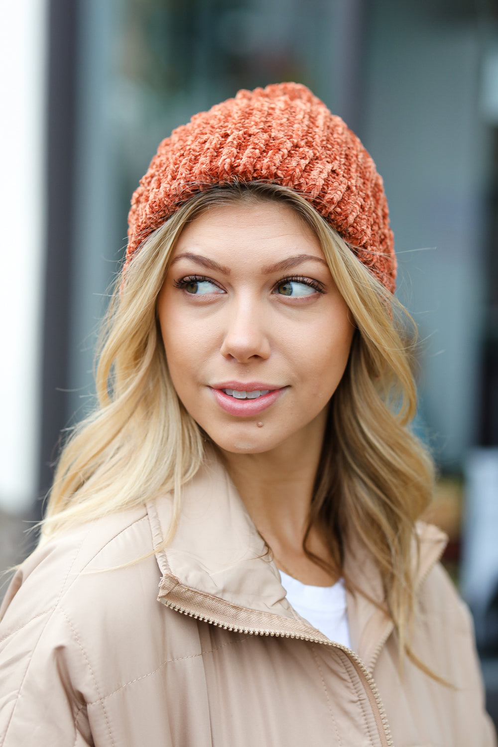 Rust Knit Velvet Chenille Fold Over Beanie showcasing its soft texture and stylish design, perfect for winter wear.