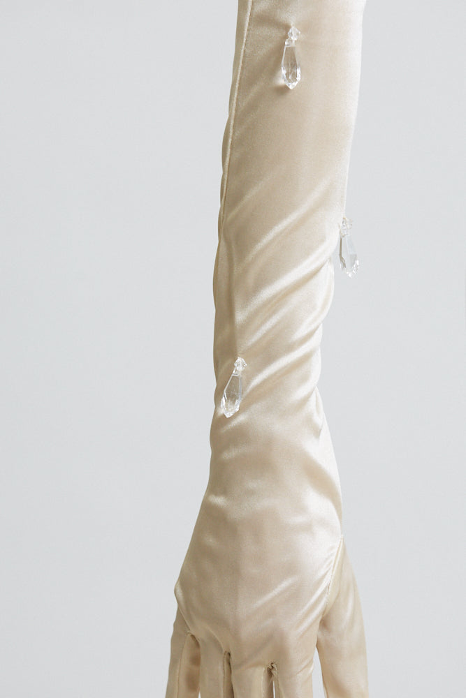 Elegant Satin Serenity Strapless Dress featuring luxe satin fabric, adjustable shoulder strap, and tear drop bead detailing.