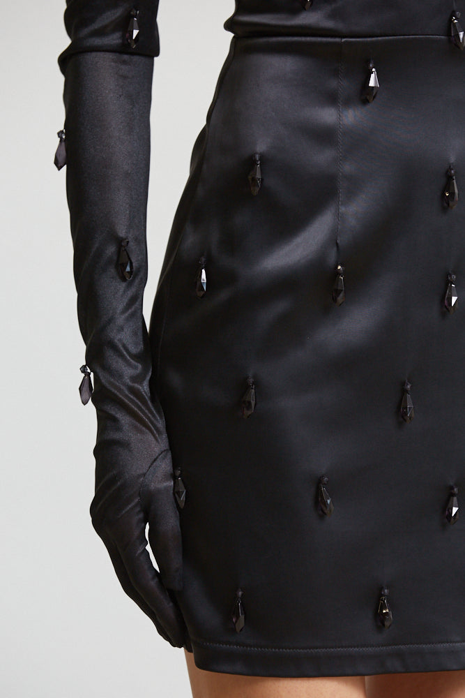 Elegant Satin Serenity Strapless Dress featuring luxe satin fabric, adjustable shoulder strap, and tear drop bead detailing.