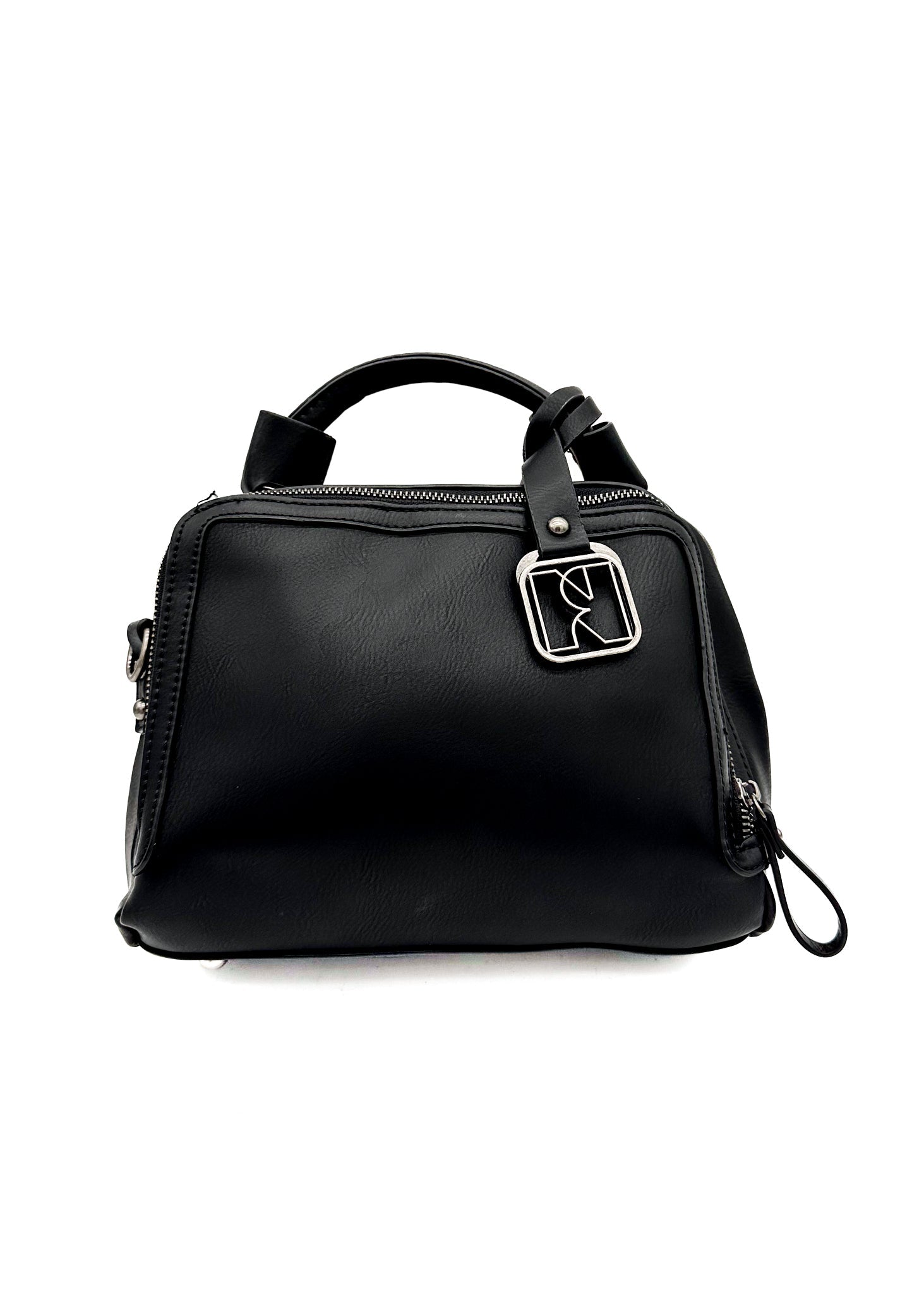 Savvy Handbag in Black featuring laser cut design and adjustable strap, showcasing its stylish faux leather finish and multiple compartments.
