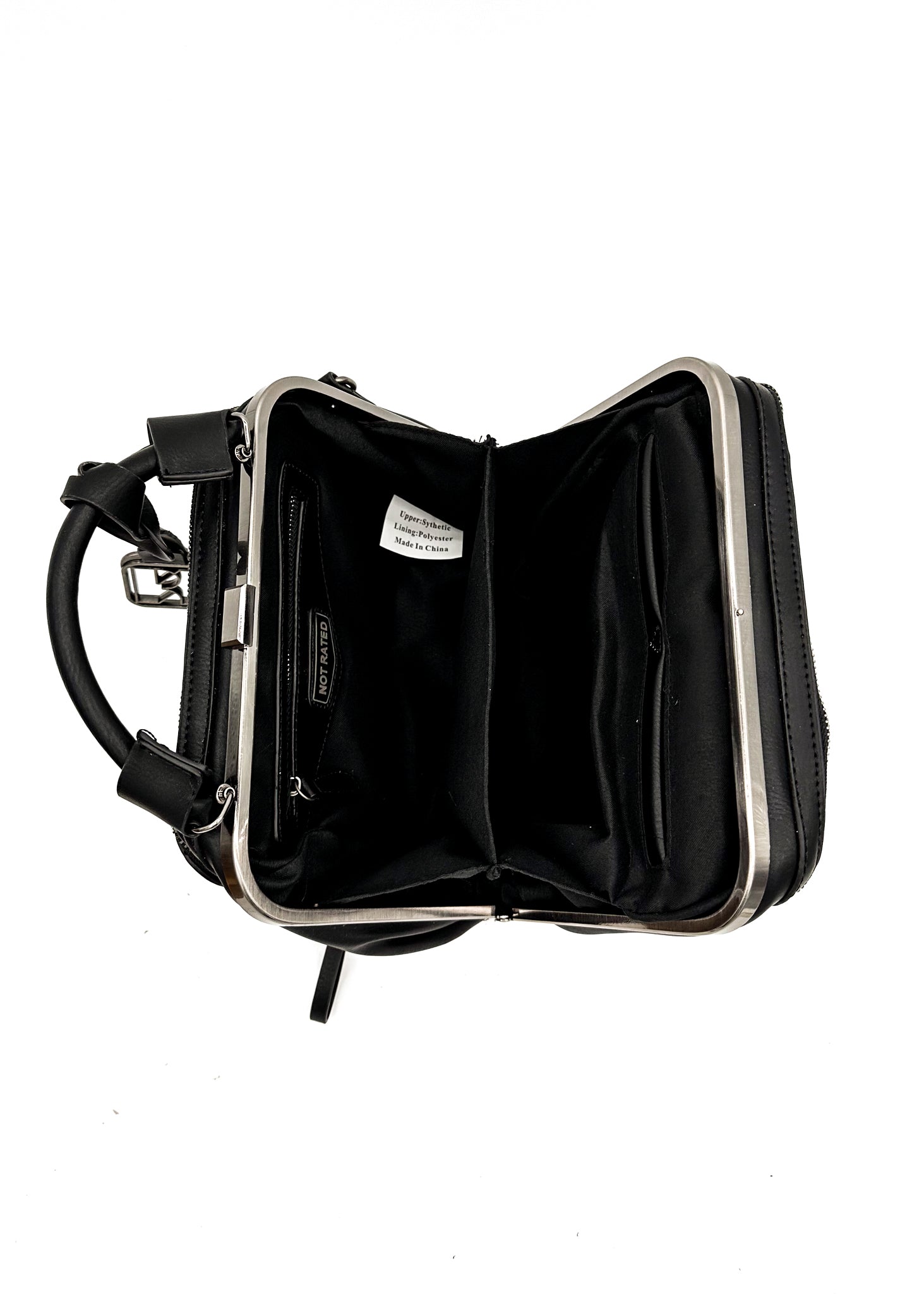 Savvy Handbag in Black featuring laser cut design and adjustable strap, showcasing its stylish faux leather finish and multiple compartments.