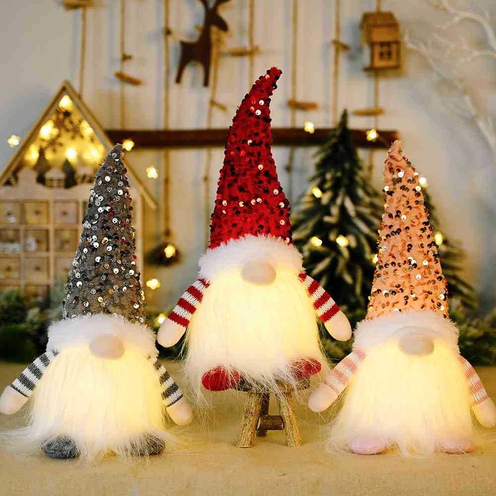 A charming Sequin Light-Up Faceless Gnome, featuring a sparkling design and vibrant colors, perfect for festive home decor.