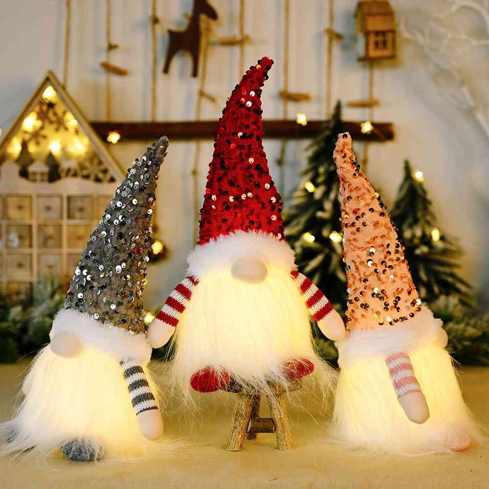 A charming Sequin Light-Up Faceless Gnome, featuring a sparkling design and vibrant colors, perfect for festive home decor.