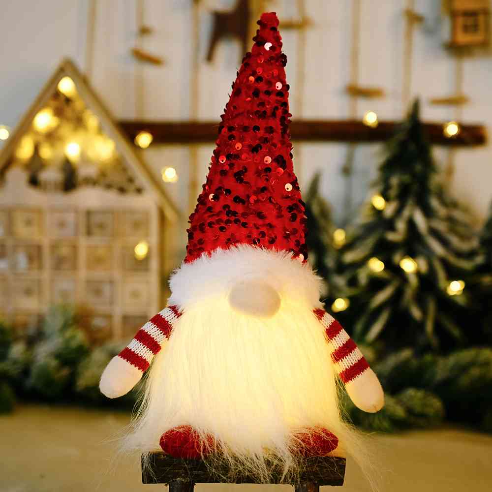 A charming Sequin Light-Up Faceless Gnome, featuring a sparkling design and vibrant colors, perfect for festive home decor.