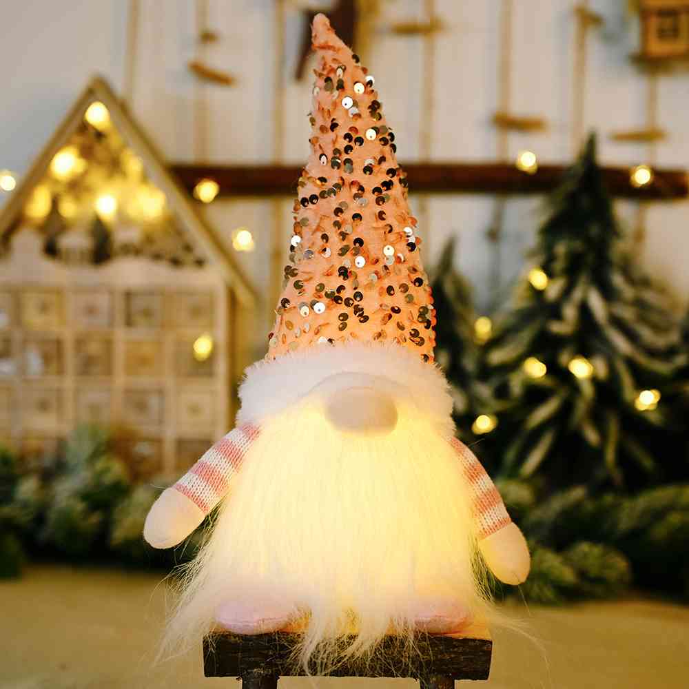 A charming Sequin Light-Up Faceless Gnome, featuring a sparkling design and vibrant colors, perfect for festive home decor.