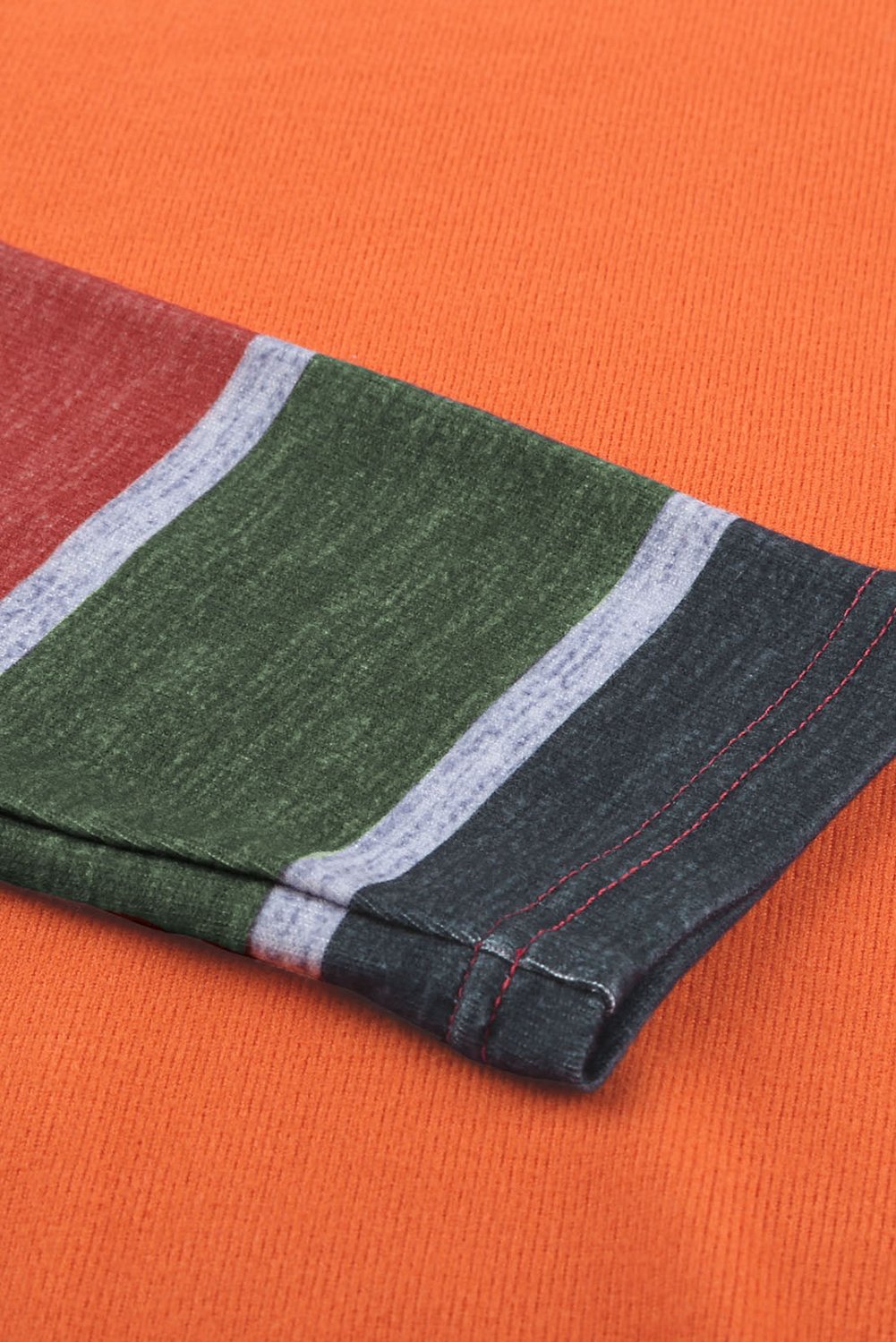 Sequin Splicing Colorful Stripes Long Sleeve Top featuring vibrant stripes and a stylish sequin pocket detail.