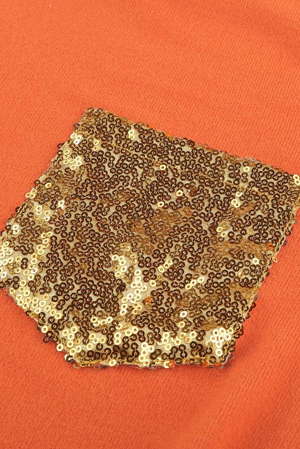 Sequin Splicing Colorful Stripes Long Sleeve Top featuring vibrant stripes and a stylish sequin pocket detail.