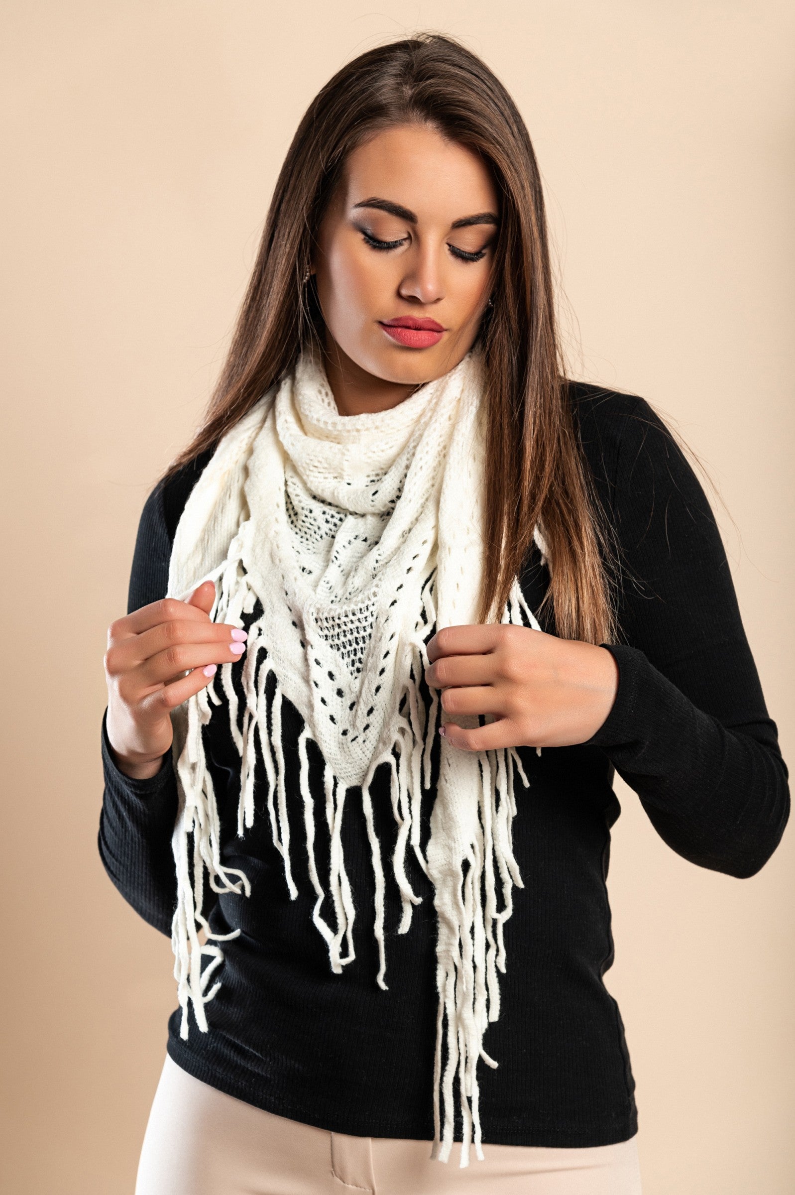 Set of 3 multicolored knitted scarves in white, black, and beige with fringes, displayed elegantly.