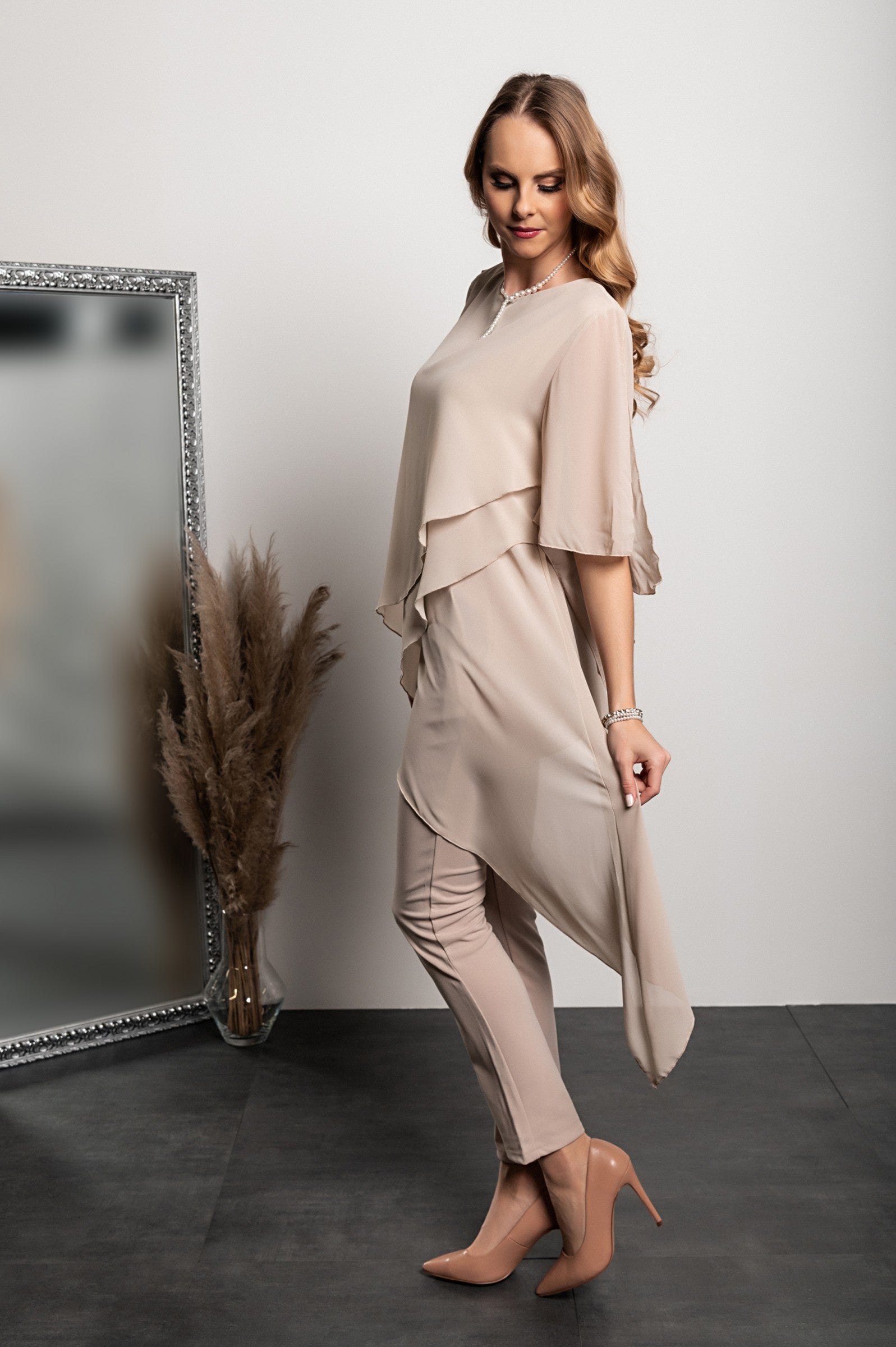 Elegant beige tunic and long pants set, showcasing sheer fabric and a loose fit, perfect for various occasions.