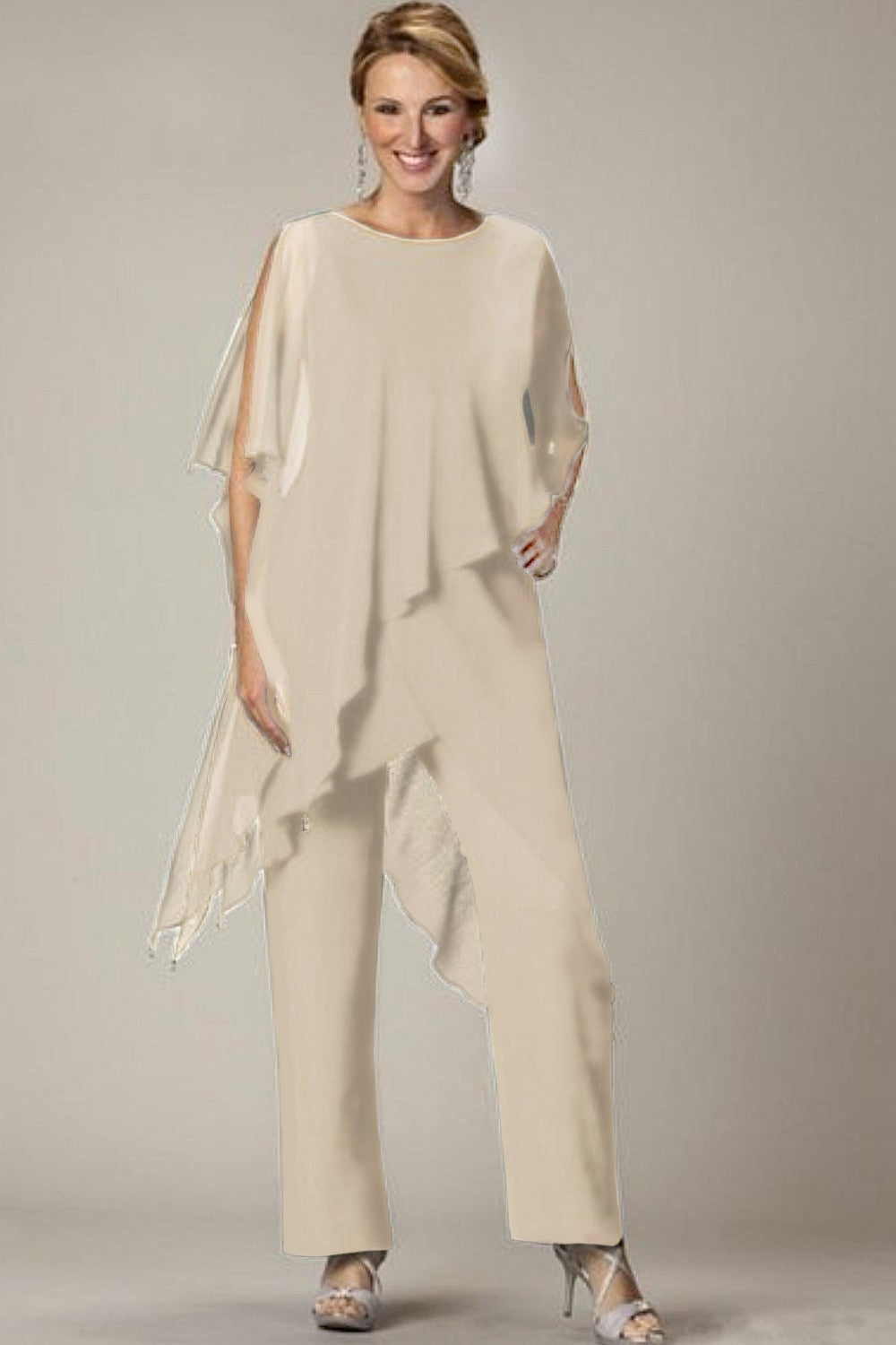 Elegant beige tunic and long pants set, showcasing sheer fabric and a loose fit, perfect for casual or formal occasions.