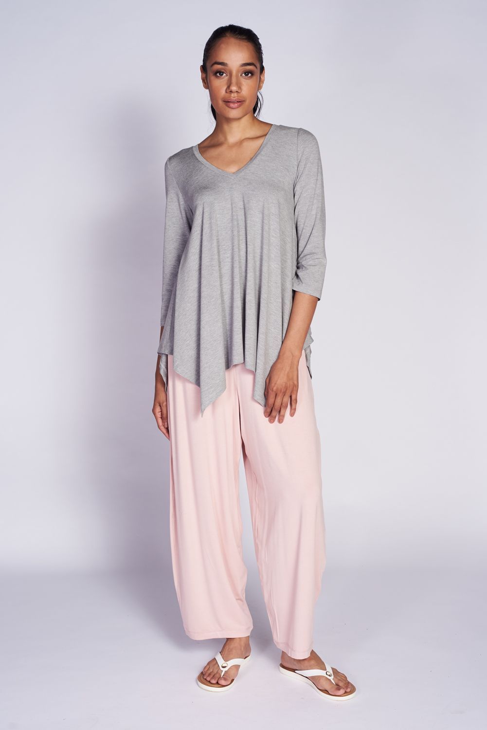 Seville Blouse in Bamboo featuring a V-neck and 3/4 sleeves, elegantly draping in soft stretch knit jersey.