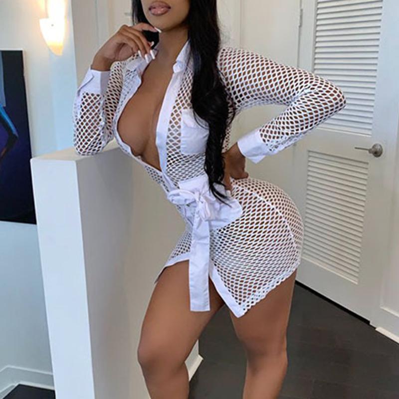 A stylish sexy white mini short neon dress for women, featuring a turn-down collar and full sleeves, perfect for night parties and clubs.