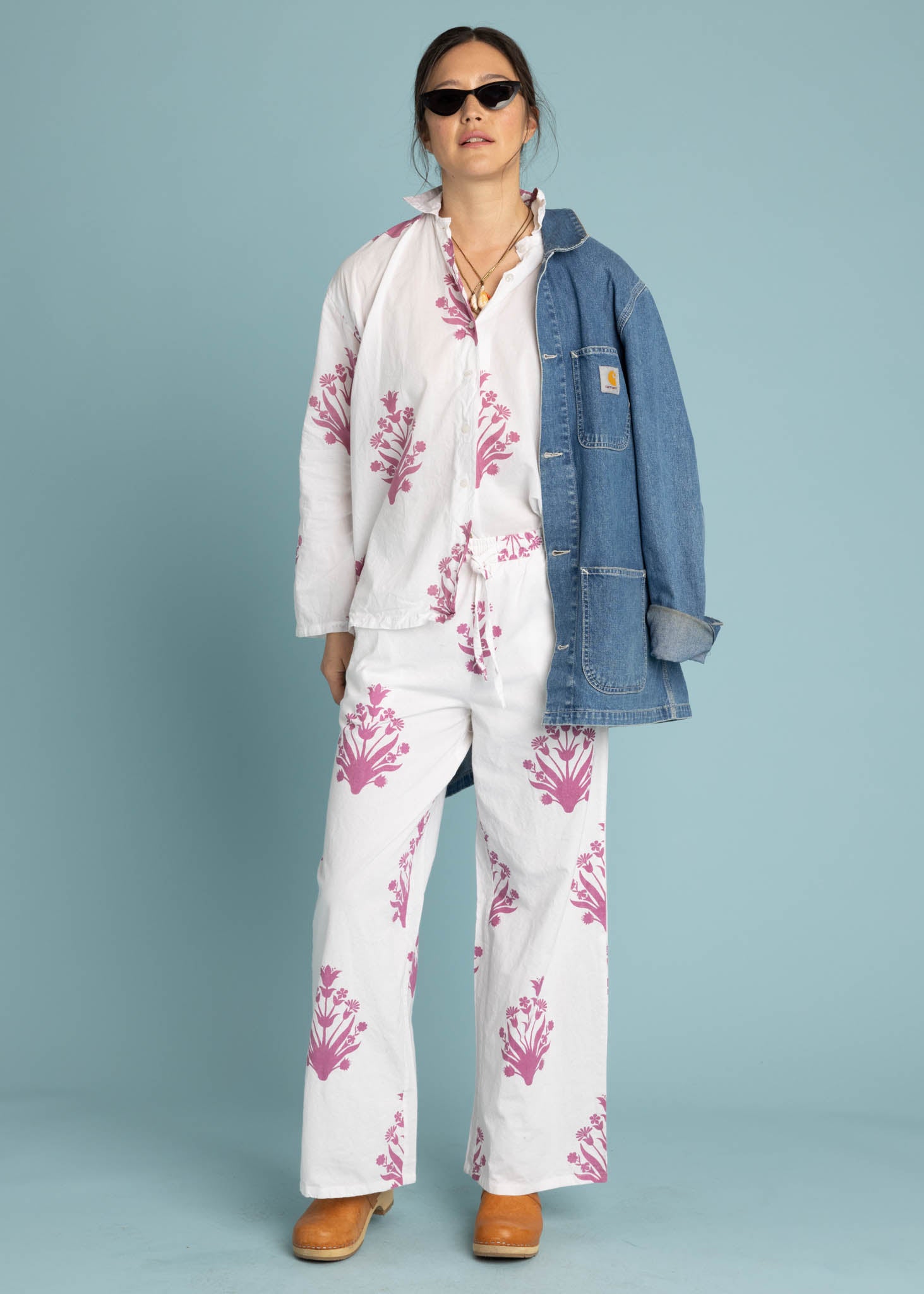 Shore Pant in Cameo Floral Dahlia featuring a modern cropped length and relaxed fit, made from organic cotton with a floral print.