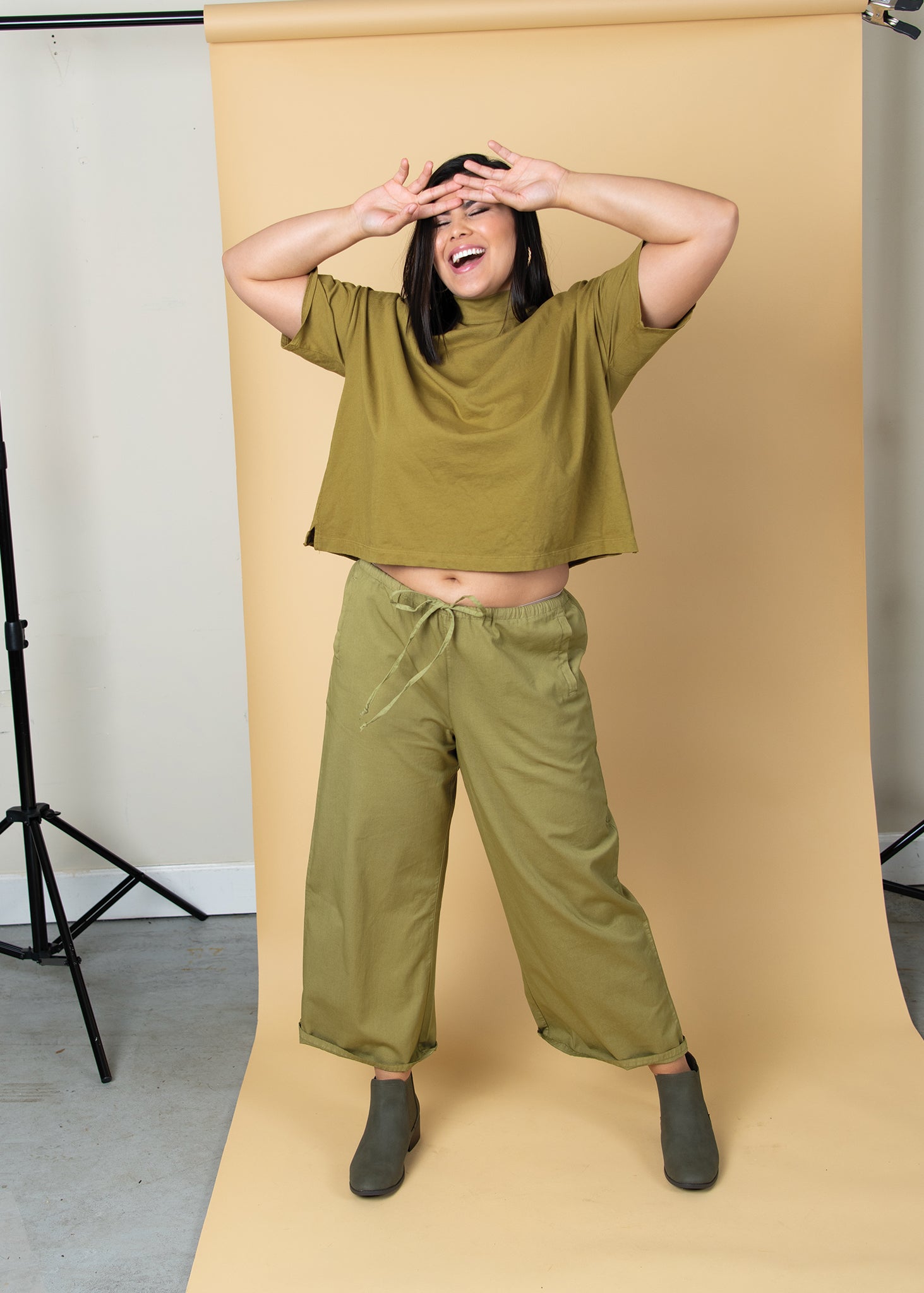 Shore Pant in Olive Oil Twill, showcasing its relaxed fit, cropped length, and elastic waist design.