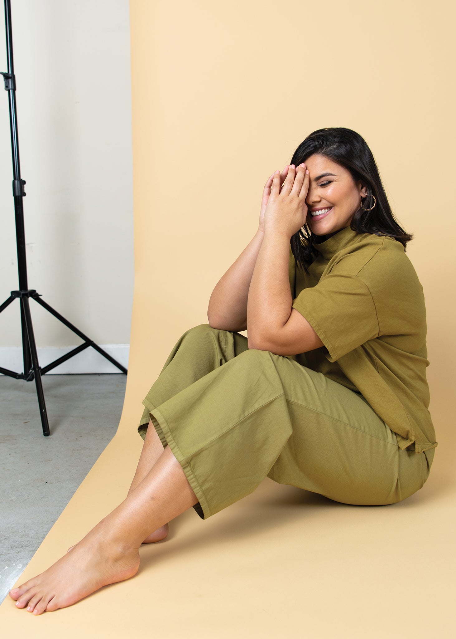 Shore Pant in Olive Oil Twill, showcasing its relaxed fit, cropped length, and elastic waist design.