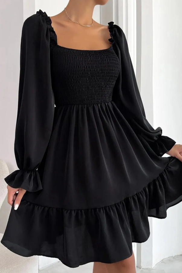 Black short dress with ruffles, featuring a square neckline and long sleeves, made from soft polyester fabric.