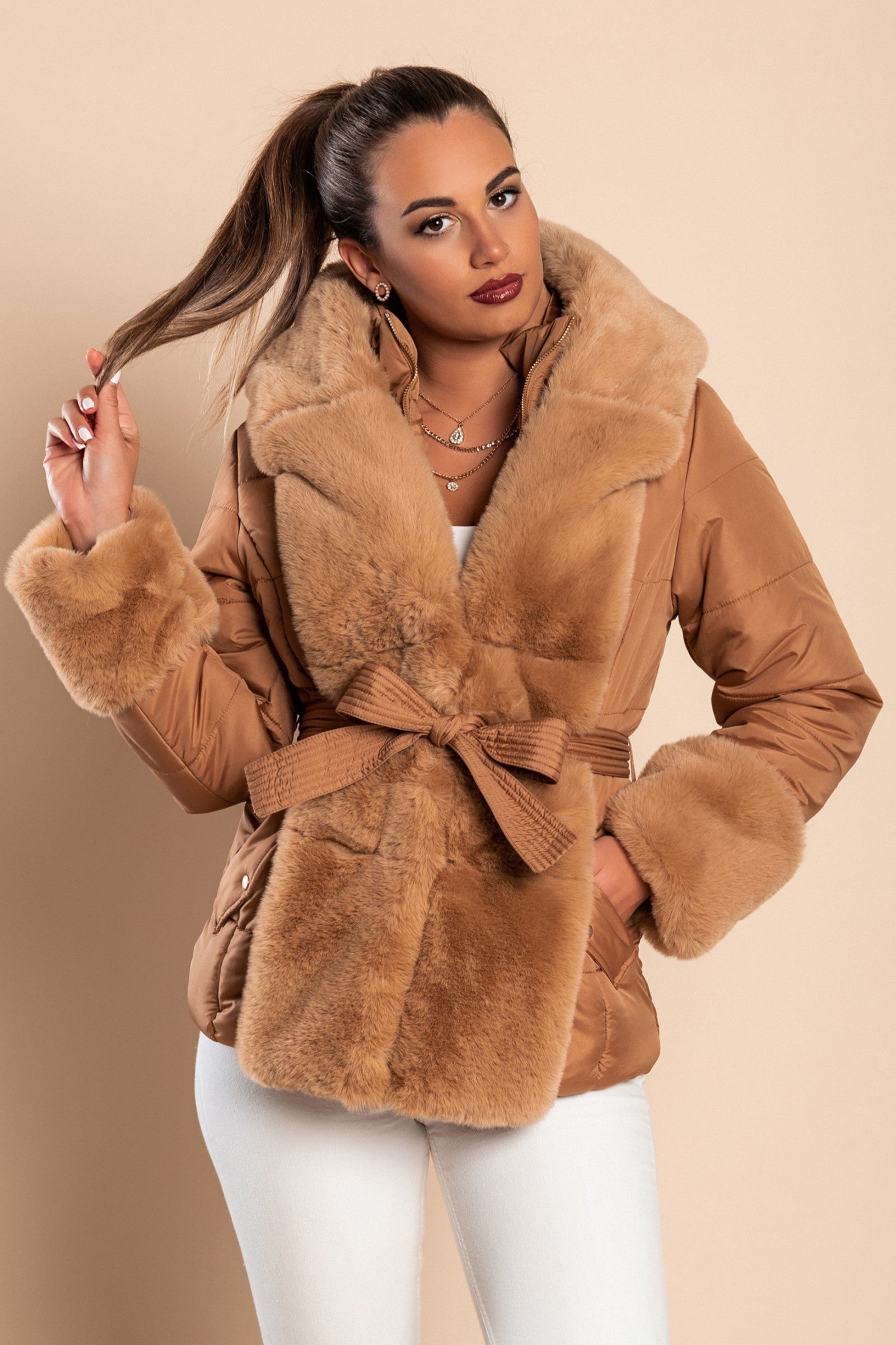 Camel short padded jacket with faux fur trim, featuring a metal zipper and side pockets, perfect for winter wear.