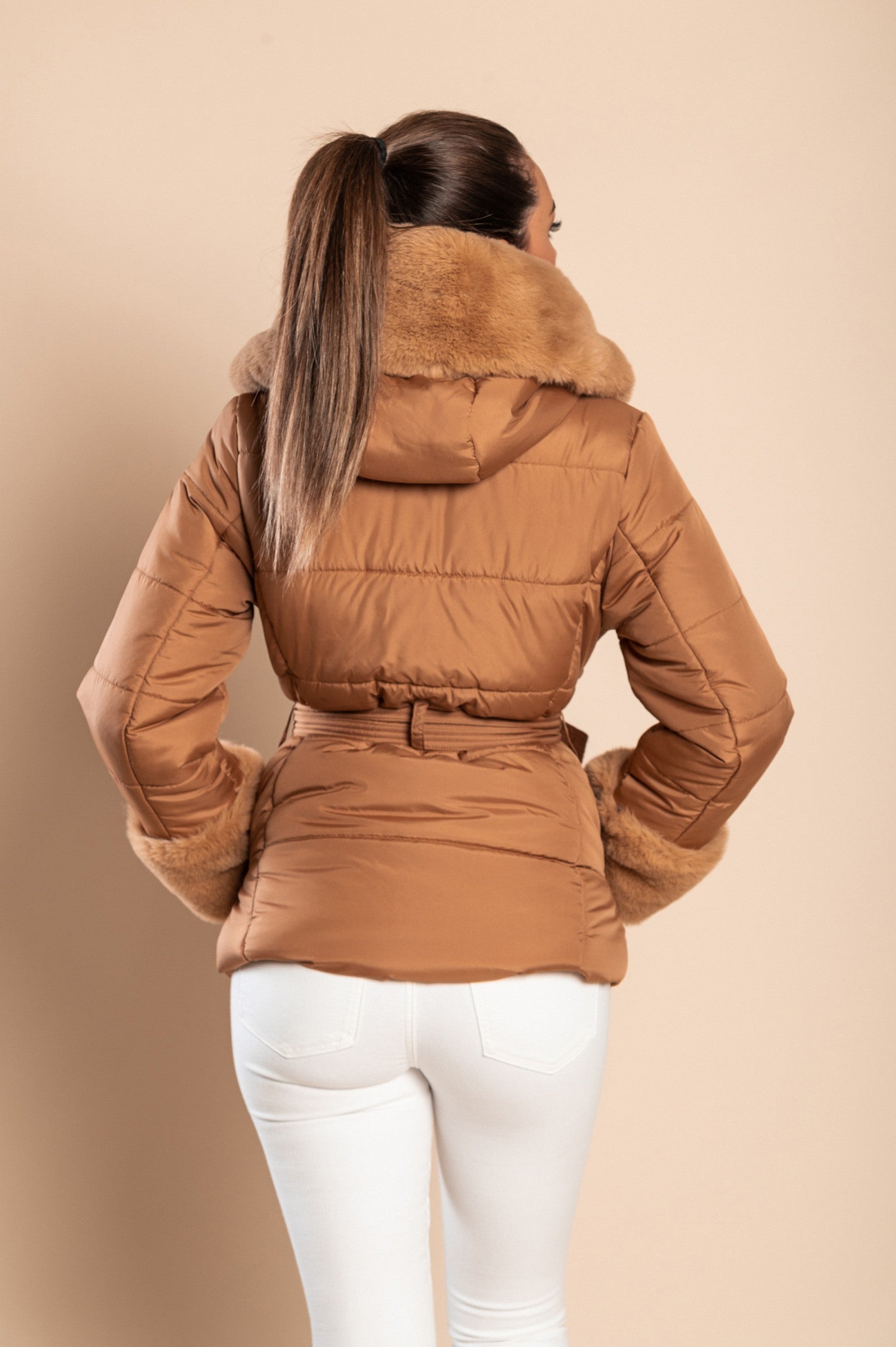 Camel short padded jacket with faux fur trim, featuring a metal zipper and side pockets, perfect for winter wear.