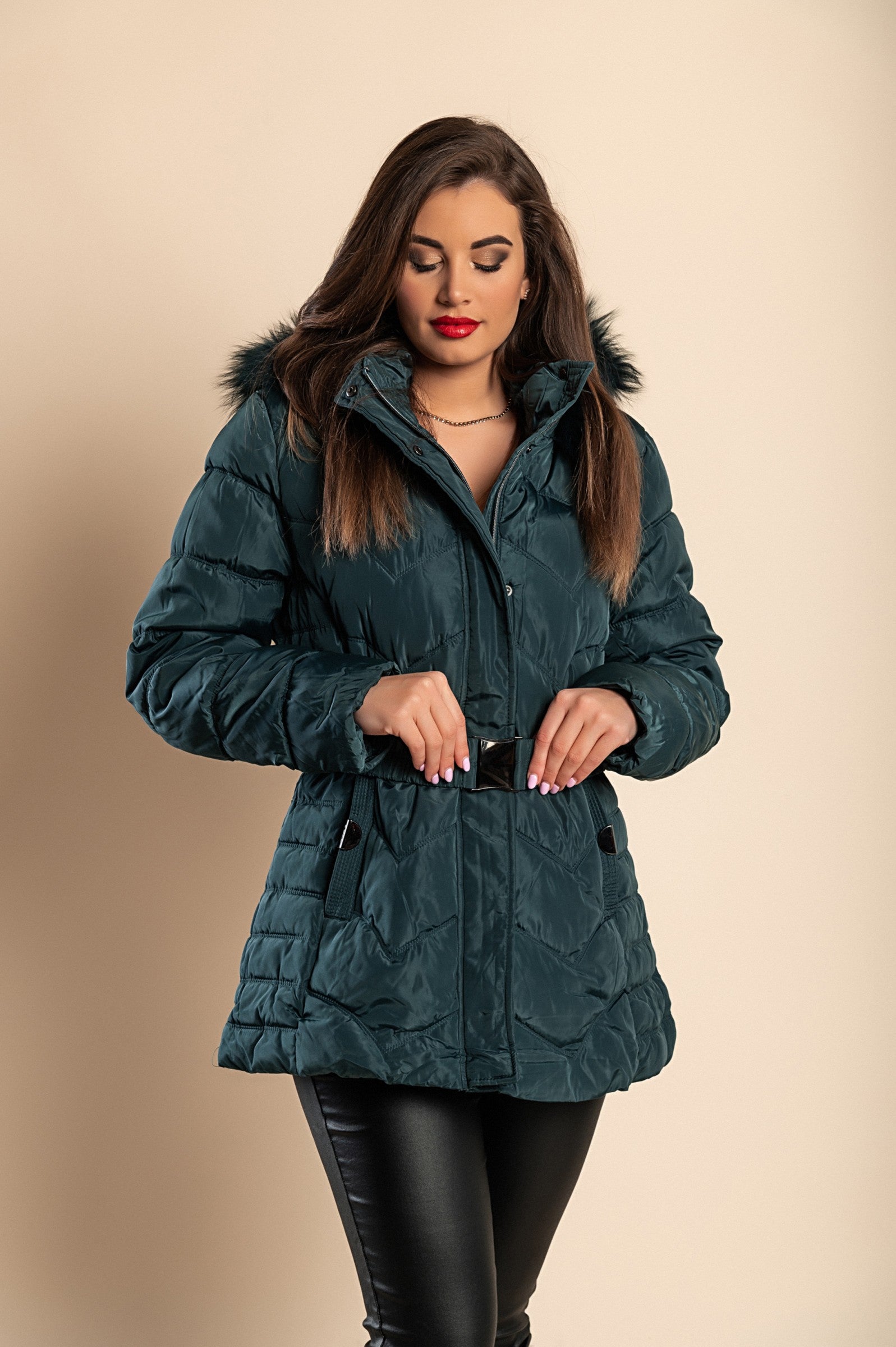 Plus size short padded winter jacket with hood in petrol color, featuring synthetic fur lining and zip closure.