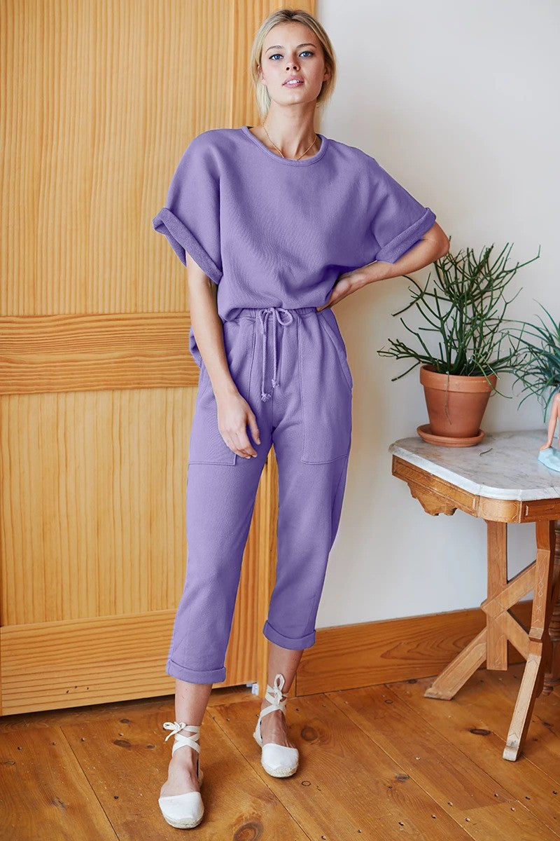 Otta Lilac Short Sleeve Loose T-Shirt Tracksuit Set featuring a soft cotton fabric, round neckline, and elastic waist trousers with pockets.