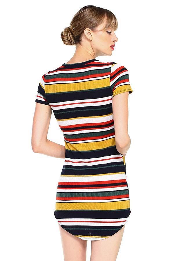 A model wearing a stylish short sleeve ribbed striped mini dress, showcasing its body contour fit and vibrant multi-stripe design.