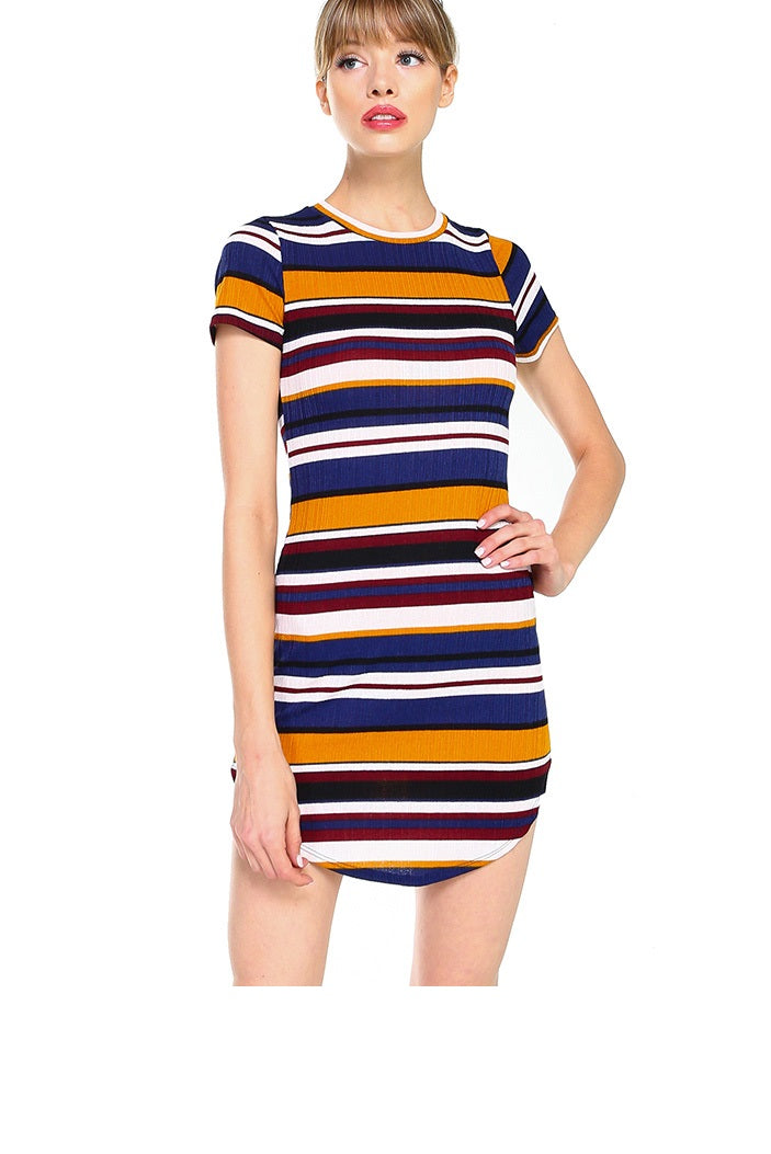 A model wearing a stylish short sleeve ribbed striped mini dress, showcasing its body contour fit and vibrant multi-stripe design.