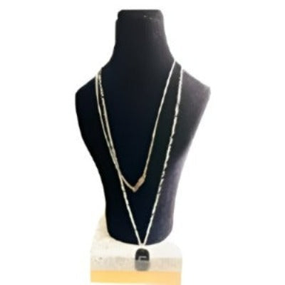 A stylish silver pendant necklace featuring a beautifully crafted pendant, perfect for enhancing any outfit.