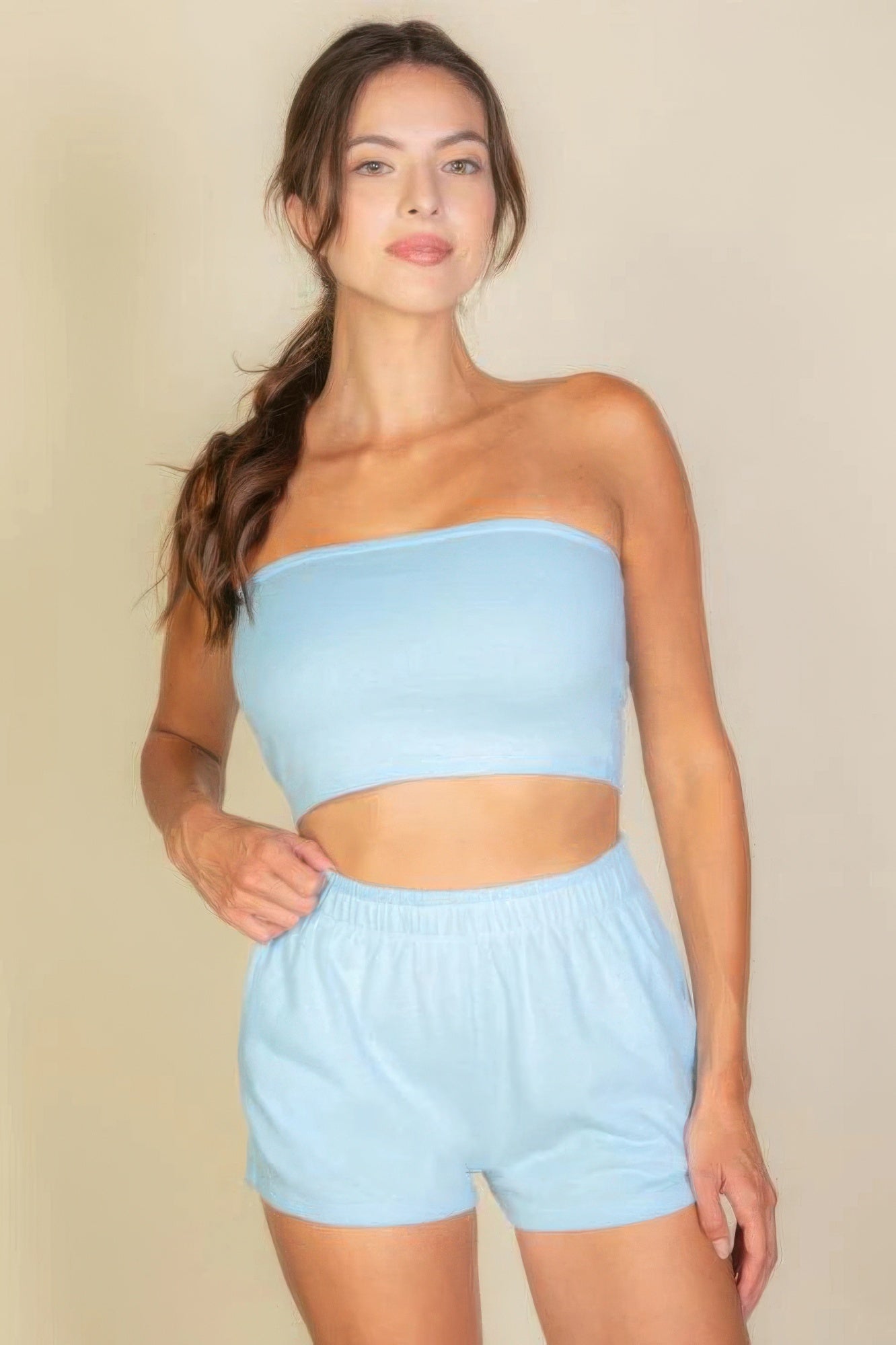 A stylish Simple Solid Color Tube Top and Shorts Two Piece Set in vibrant blue, showcasing the snug fit of the tube top and comfortable shorts.