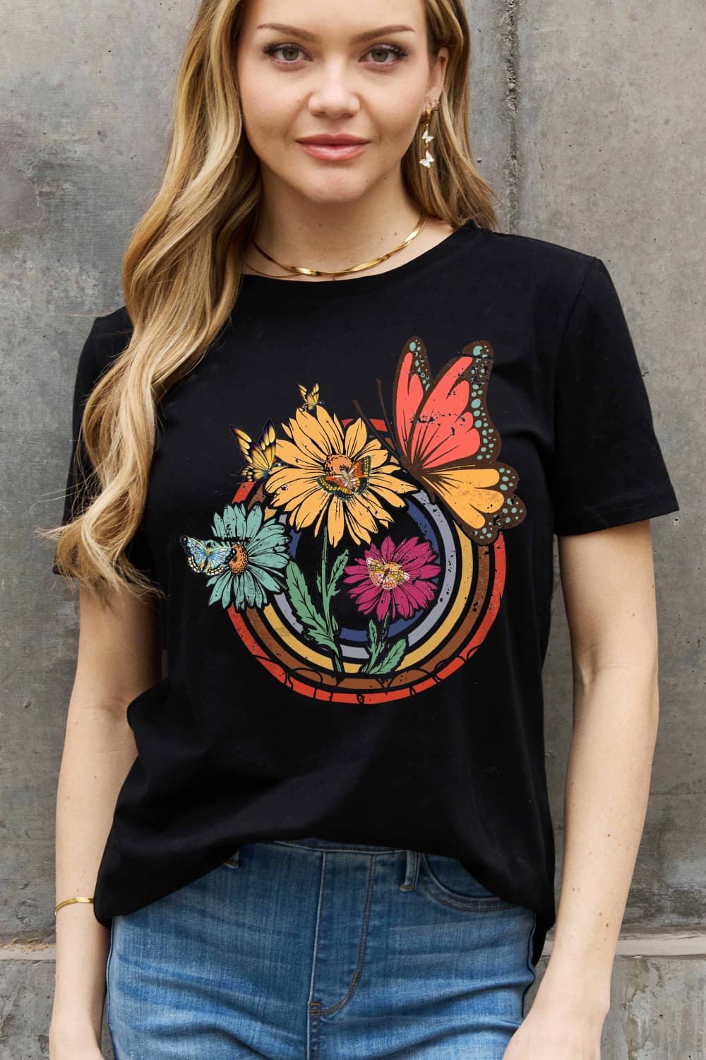 Simply Love Full Size Flower & Butterfly Graphic Cotton Tee featuring a vibrant floral and butterfly design on a casual round neck tee.