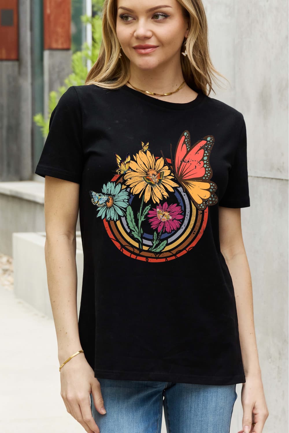 Simply Love Full Size Flower & Butterfly Graphic Cotton Tee featuring a vibrant floral and butterfly design on a casual round neck tee.