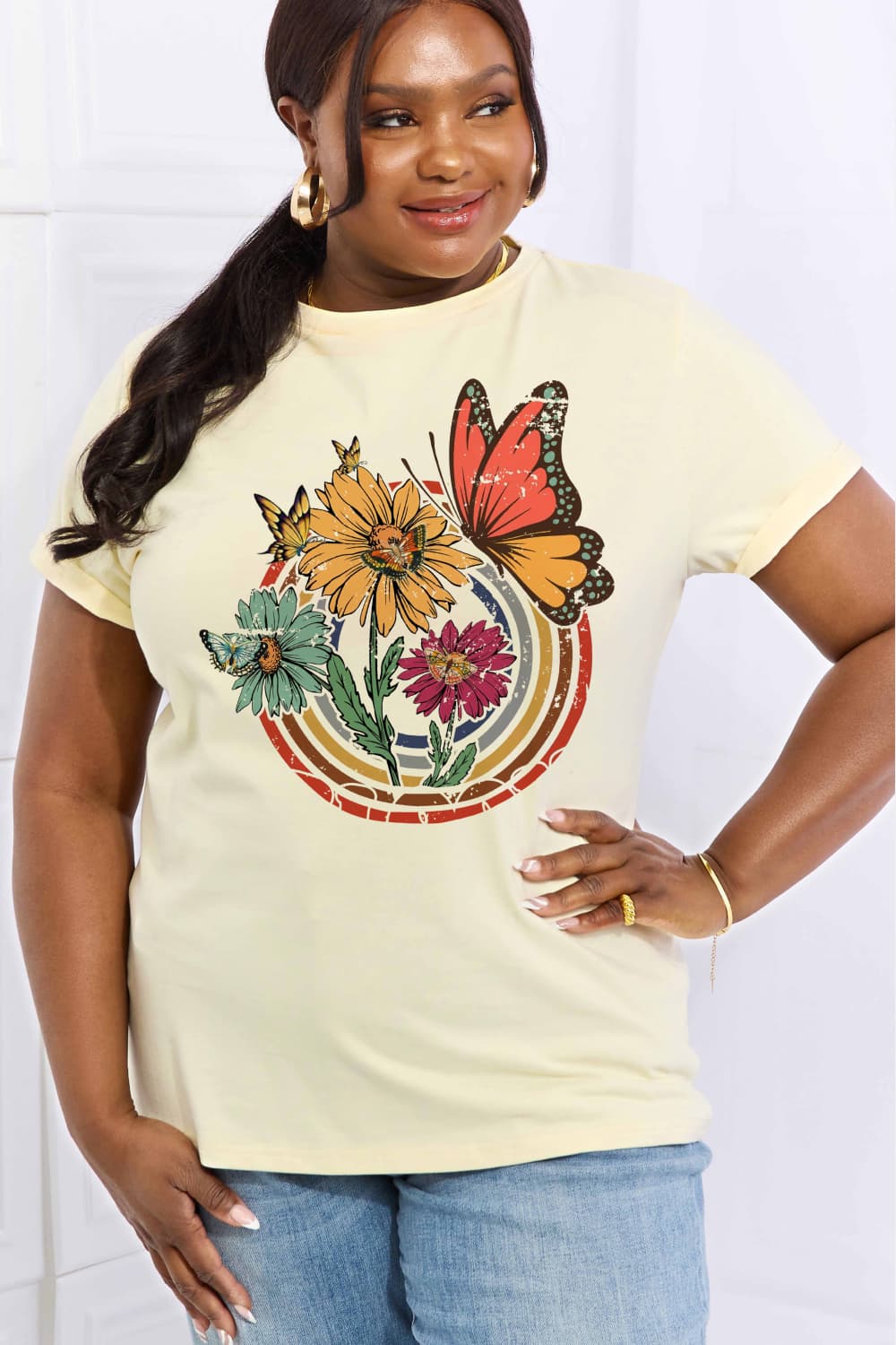Simply Love Full Size Flower & Butterfly Graphic Cotton Tee featuring a vibrant floral and butterfly design on a casual round neck tee.