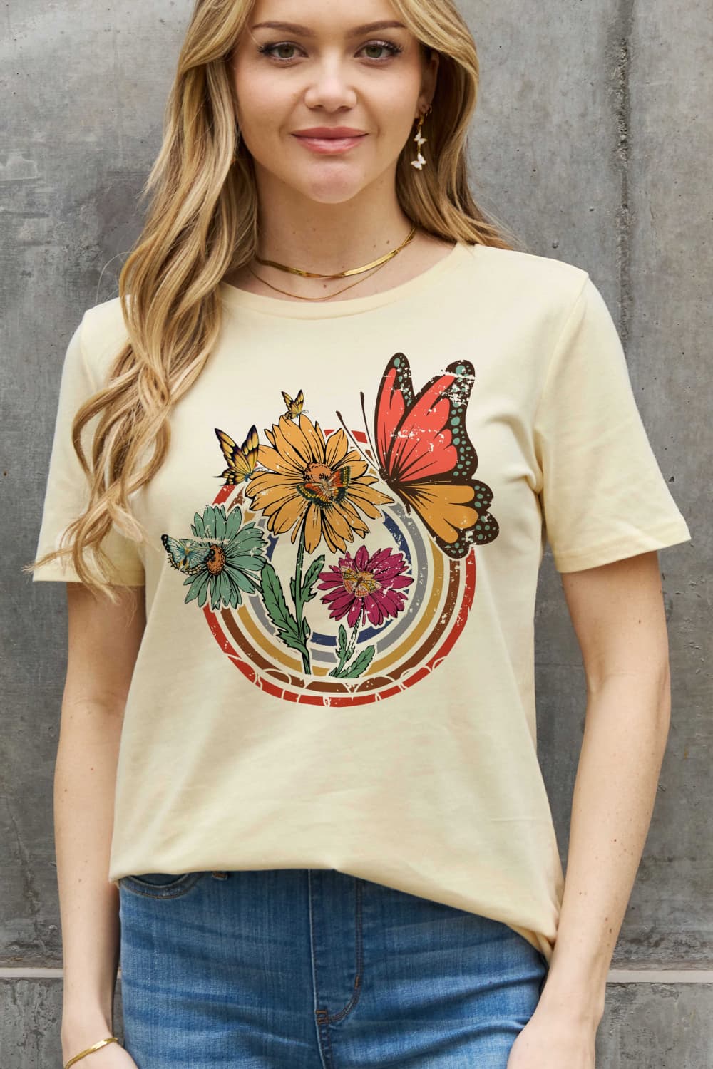 Simply Love Full Size Flower & Butterfly Graphic Cotton Tee featuring a vibrant floral and butterfly design on a casual round neck tee.